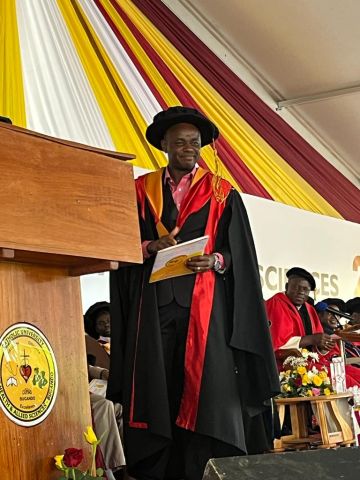 Dr. Kavishe receiving his PhD diploma