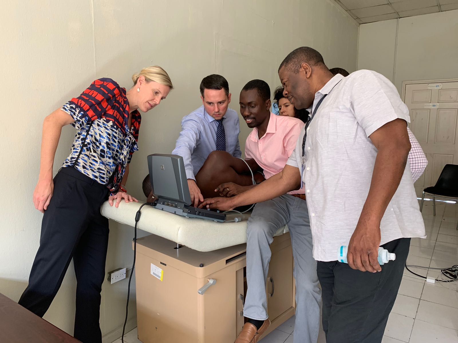 Dr. McNairy and Dr. Kingery working with Haitian study director, Dr. Victor, on cardiac imaging